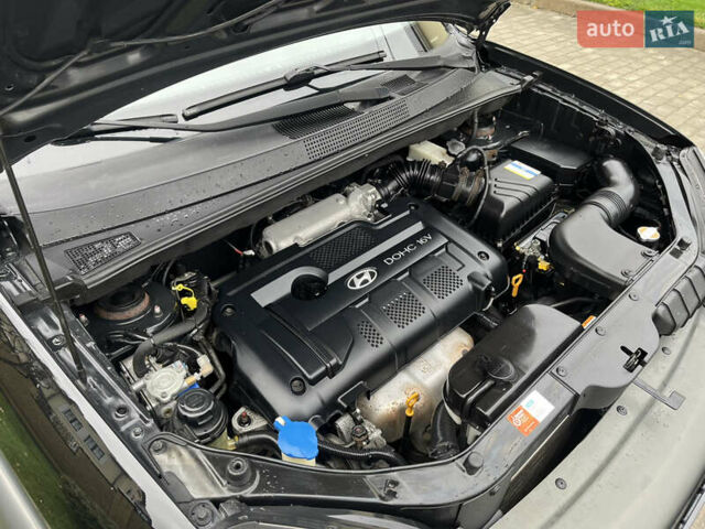 Черный Хендай Туксон, объемом двигателя 2 л и пробегом 107 тыс. км за 8900 $, фото 17 на Automoto.ua