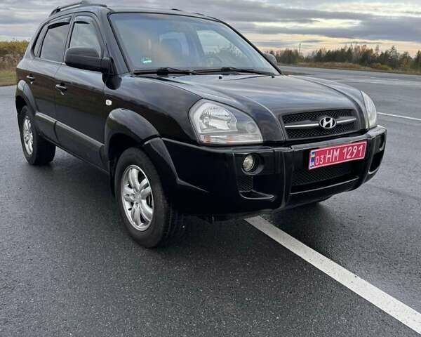 Черный Хендай Туксон, объемом двигателя 2 л и пробегом 253 тыс. км за 8299 $, фото 18 на Automoto.ua