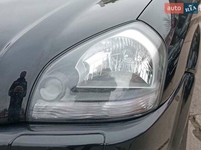 Черный Хендай Туксон, объемом двигателя 2 л и пробегом 192 тыс. км за 7990 $, фото 4 на Automoto.ua