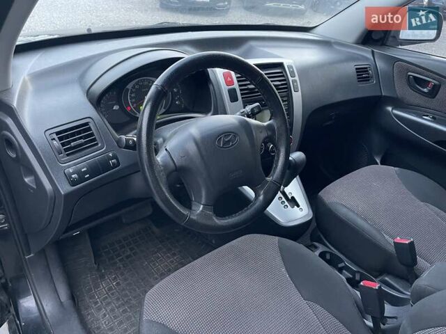 Хендай Туксон 2008 у Києві на Automoto.ua Чорний Хендай Туксон, об'ємом двигуна 2 л та пробігом 110 тис. км за 8750 $, фото 14 на Automoto.ua