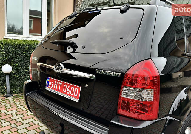 Чорний Хендай Туксон, об'ємом двигуна 2 л та пробігом 182 тис. км за 8299 $, фото 15 на Automoto.ua