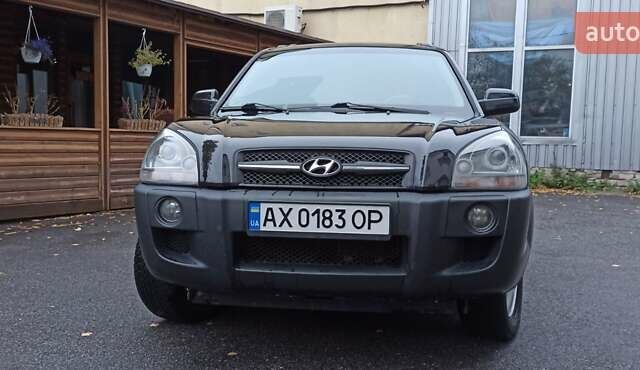 Хендай Туксон 2008 у Харкові на Automoto.ua Чорний Хендай Туксон, об'ємом двигуна 1.99 л та пробігом 188 тис. км за 8800 $, фото 4 на Automoto.ua