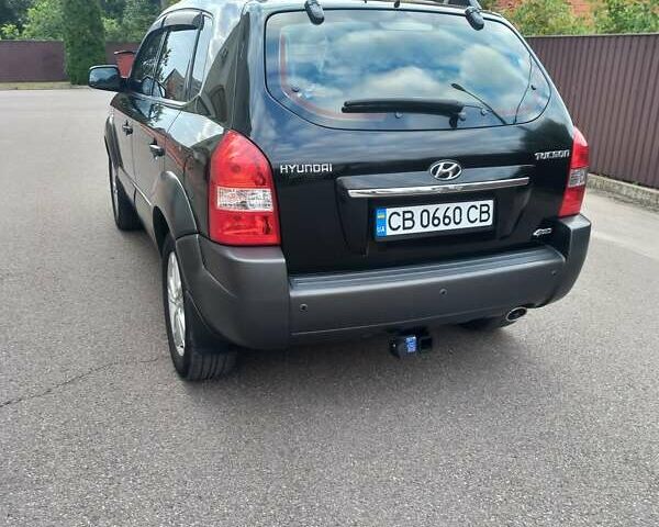 Черный Хендай Туксон, объемом двигателя 2 л и пробегом 168 тыс. км за 9000 $, фото 9 на Automoto.ua