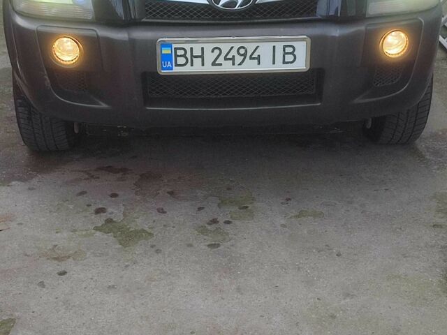Чорний Хендай Туксон, об'ємом двигуна 2 л та пробігом 214 тис. км за 6000 $, фото 2 на Automoto.ua