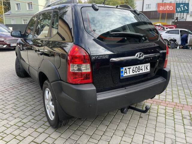 Черный Хендай Туксон, объемом двигателя 1.98 л и пробегом 177 тыс. км за 7600 $, фото 12 на Automoto.ua