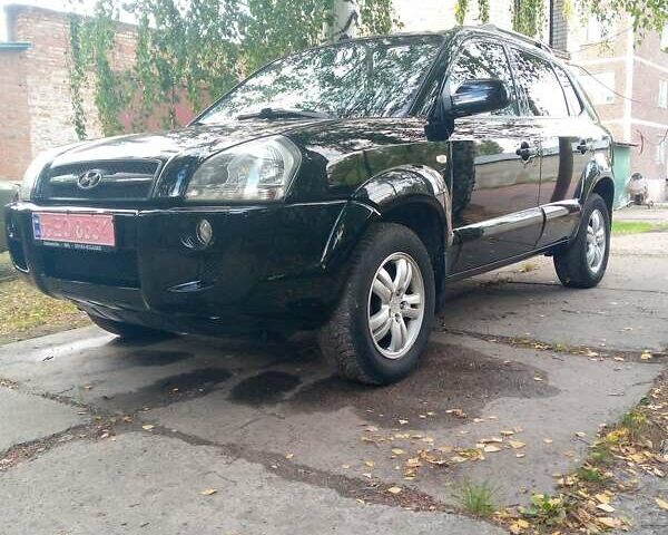 Черный Хендай Туксон, объемом двигателя 2 л и пробегом 224 тыс. км за 7900 $, фото 3 на Automoto.ua