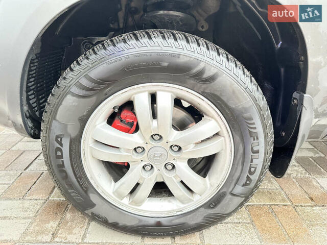 Чорний Хендай Туксон, об'ємом двигуна 2.66 л та пробігом 395 тис. км за 9950 $, фото 13 на Automoto.ua