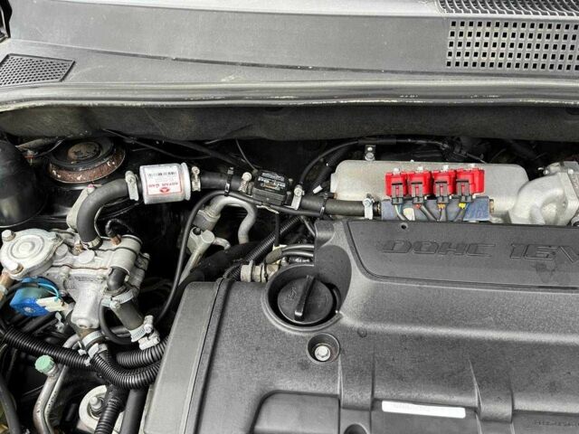 Черный Хендай Туксон, объемом двигателя 2 л и пробегом 270 тыс. км за 7600 $, фото 5 на Automoto.ua