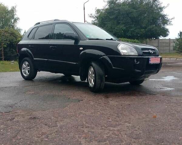 Чорний Хендай Туксон, об'ємом двигуна 2 л та пробігом 225 тис. км за 7850 $, фото 16 на Automoto.ua