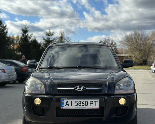 Черный Хендай Туксон, объемом двигателя 2 л и пробегом 300 тыс. км за 8300 $, фото 3 на Automoto.ua