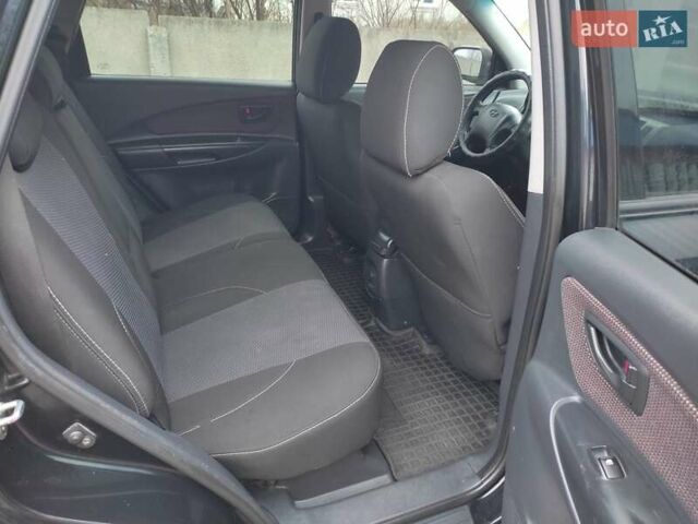 Черный Хендай Туксон, объемом двигателя 2 л и пробегом 237 тыс. км за 7500 $, фото 16 на Automoto.ua