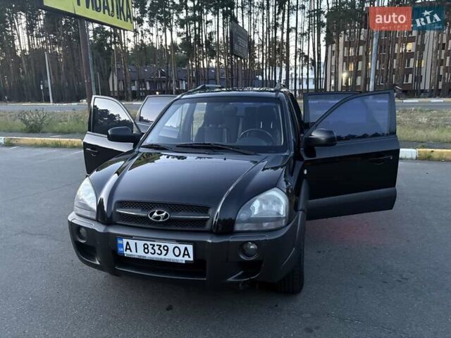 Чорний Хендай Туксон, об'ємом двигуна 1.98 л та пробігом 273 тис. км за 10000 $, фото 22 на Automoto.ua