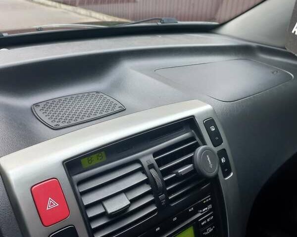 Черный Хендай Туксон, объемом двигателя 2 л и пробегом 168 тыс. км за 9000 $, фото 29 на Automoto.ua