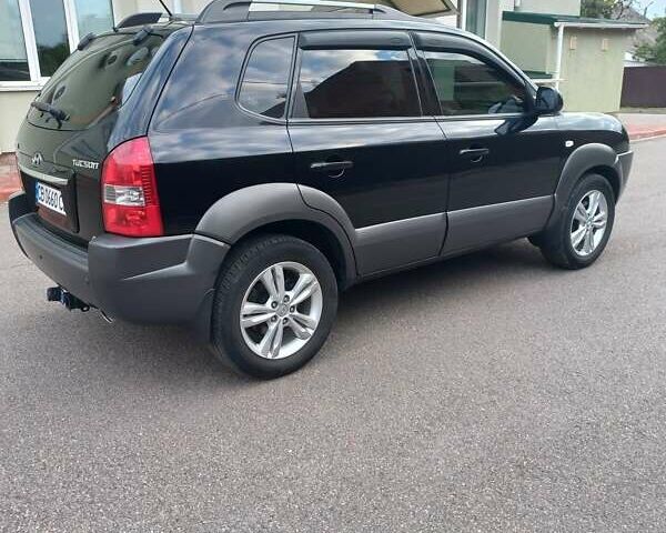 Черный Хендай Туксон, объемом двигателя 2 л и пробегом 168 тыс. км за 9000 $, фото 6 на Automoto.ua