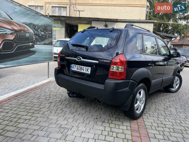 Черный Хендай Туксон, объемом двигателя 1.98 л и пробегом 177 тыс. км за 7600 $, фото 9 на Automoto.ua