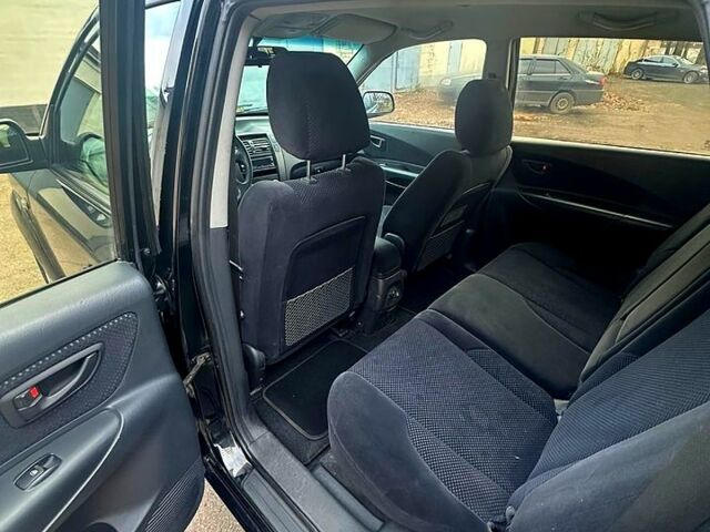 Черный Хендай Туксон, объемом двигателя 2 л и пробегом 215 тыс. км за 6700 $, фото 7 на Automoto.ua