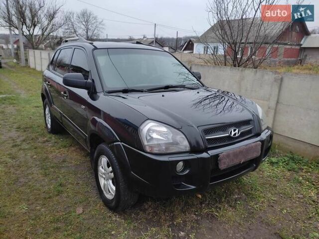 Черный Хендай Туксон, объемом двигателя 2 л и пробегом 237 тыс. км за 7500 $, фото 7 на Automoto.ua