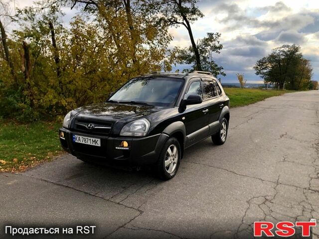 Черный Хендай Туксон, объемом двигателя 2 л и пробегом 220 тыс. км за 8000 $, фото 1 на Automoto.ua