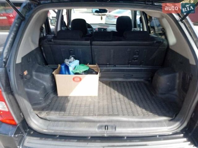 Черный Хендай Туксон, объемом двигателя 1.98 л и пробегом 195 тыс. км за 6981 $, фото 15 на Automoto.ua