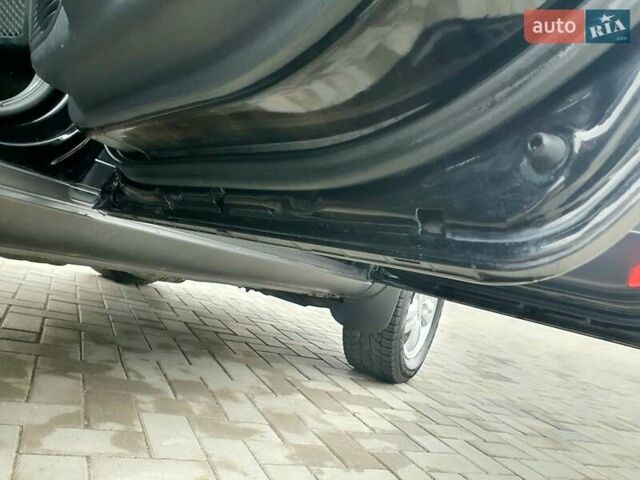 Чорний Хендай Туксон, об'ємом двигуна 2 л та пробігом 225 тис. км за 8000 $, фото 50 на Automoto.ua