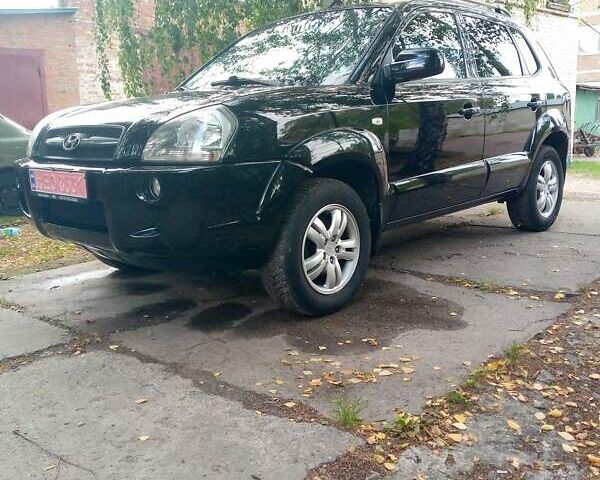 Черный Хендай Туксон, объемом двигателя 2 л и пробегом 224 тыс. км за 7900 $, фото 6 на Automoto.ua