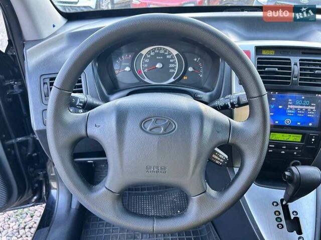 Черный Хендай Туксон, объемом двигателя 2 л и пробегом 230 тыс. км за 7500 $, фото 17 на Automoto.ua