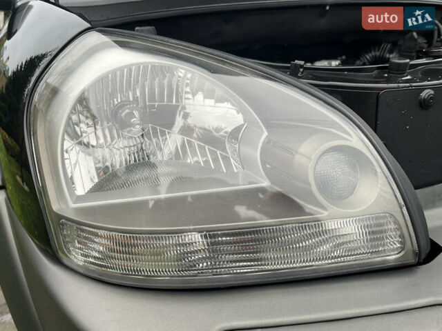 Черный Хендай Туксон, объемом двигателя 2 л и пробегом 107 тыс. км за 8900 $, фото 13 на Automoto.ua