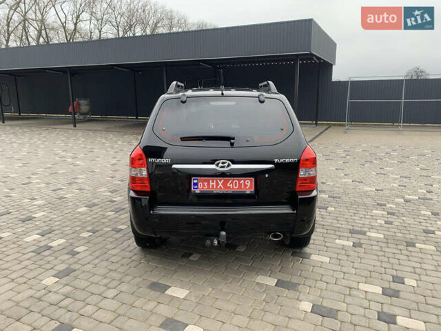Черный Хендай Туксон, объемом двигателя 2 л и пробегом 198 тыс. км за 7500 $, фото 5 на Automoto.ua
