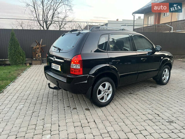 Черный Хендай Туксон, объемом двигателя 2 л и пробегом 276 тыс. км за 7450 $, фото 18 на Automoto.ua