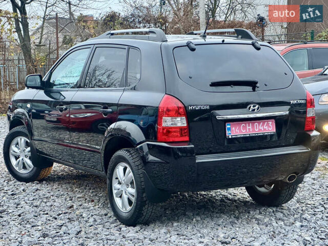 Черный Хендай Туксон, объемом двигателя 1.98 л и пробегом 96 тыс. км за 9900 $, фото 6 на Automoto.ua