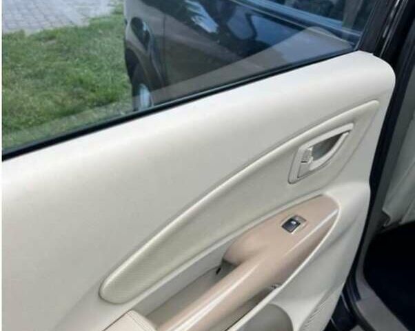 Черный Хендай Туксон, объемом двигателя 1.98 л и пробегом 300 тыс. км за 6800 $, фото 2 на Automoto.ua