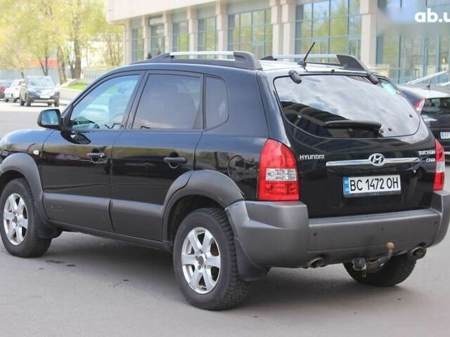 Черный Хендай Туксон, объемом двигателя 2 л и пробегом 210 тыс. км за 8999 $, фото 7 на Automoto.ua