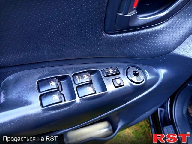 Черный Хендай Туксон, объемом двигателя 2 л и пробегом 187 тыс. км за 7900 $, фото 9 на Automoto.ua