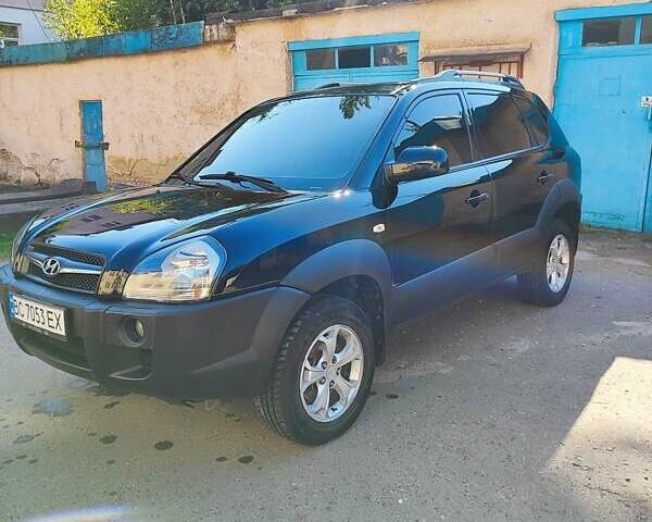 Черный Хендай Туксон, объемом двигателя 1.98 л и пробегом 330 тыс. км за 8200 $, фото 8 на Automoto.ua