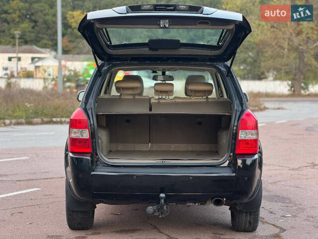 Черный Хендай Туксон, объемом двигателя 2 л и пробегом 361 тыс. км за 6499 $, фото 8 на Automoto.ua