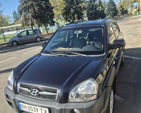 Черный Хендай Туксон, объемом двигателя 1.98 л и пробегом 93 тыс. км за 11800 $, фото 9 на Automoto.ua