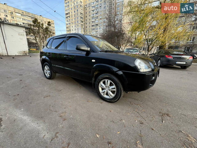 Черный Хендай Туксон, объемом двигателя 1.98 л и пробегом 196 тыс. км за 7999 $, фото 10 на Automoto.ua