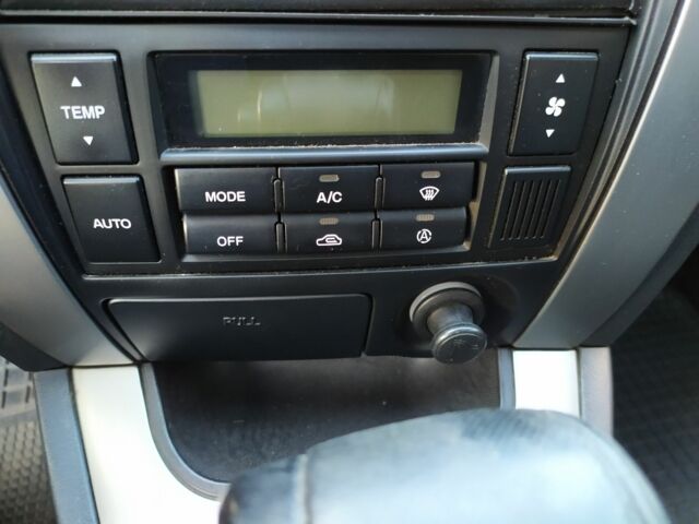 Черный Хендай Туксон, объемом двигателя 2 л и пробегом 162 тыс. км за 8500 $, фото 4 на Automoto.ua