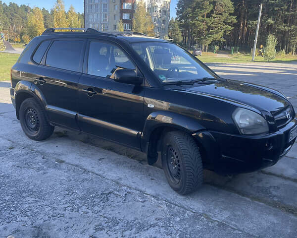 Черный Хендай Туксон, объемом двигателя 1.98 л и пробегом 262 тыс. км за 7900 $, фото 4 на Automoto.ua