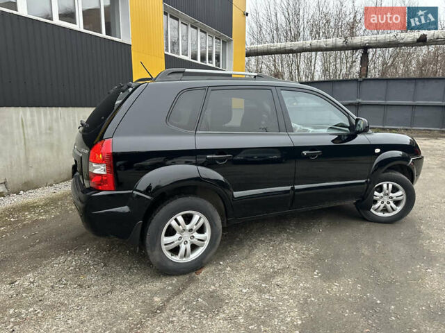 Чорний Хендай Туксон, об'ємом двигуна 2 л та пробігом 243 тис. км за 7999 $, фото 21 на Automoto.ua