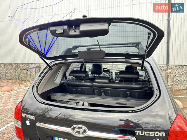 Чорний Хендай Туксон, об'ємом двигуна 2.66 л та пробігом 395 тис. км за 9950 $, фото 11 на Automoto.ua