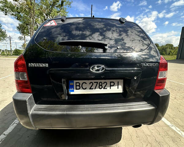 Чорний Хендай Туксон, об'ємом двигуна 1.98 л та пробігом 279 тис. км за 8200 $, фото 13 на Automoto.ua