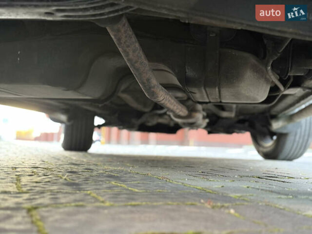 Чорний Хендай Туксон, об'ємом двигуна 2 л та пробігом 156 тис. км за 7850 $, фото 58 на Automoto.ua
