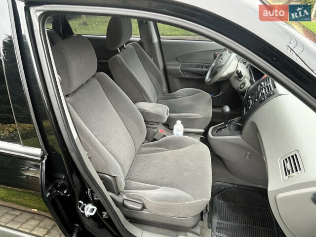 Черный Хендай Туксон, объемом двигателя 2 л и пробегом 107 тыс. км за 8900 $, фото 32 на Automoto.ua