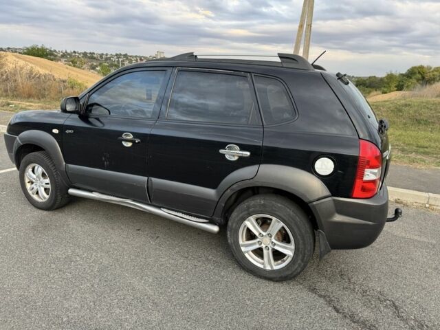 Чорний Хендай Туксон, об'ємом двигуна 2 л та пробігом 291 тис. км за 5400 $, фото 5 на Automoto.ua