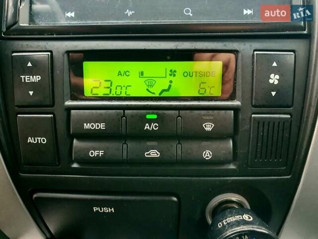 Чорний Хендай Туксон, об'ємом двигуна 2 л та пробігом 225 тис. км за 8000 $, фото 55 на Automoto.ua