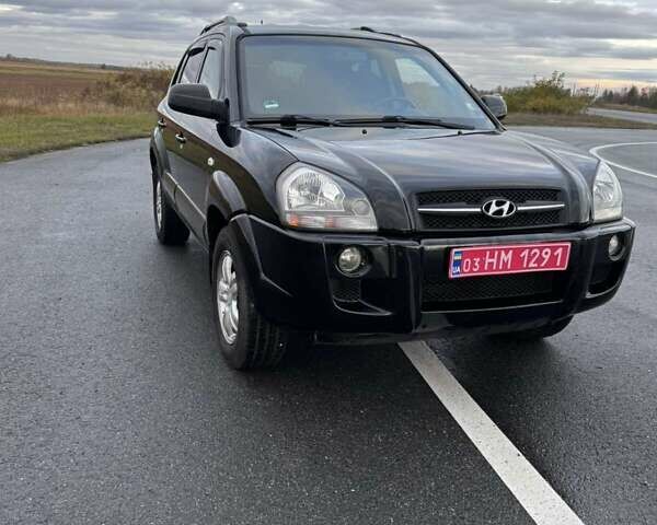 Черный Хендай Туксон, объемом двигателя 2 л и пробегом 253 тыс. км за 8299 $, фото 1 на Automoto.ua