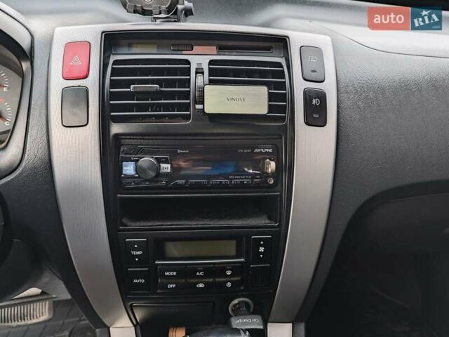 Черный Хендай Туксон, объемом двигателя 2 л и пробегом 182 тыс. км за 9000 $, фото 11 на Automoto.ua