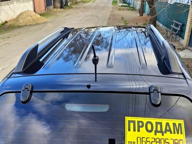Черный Хендай Туксон, объемом двигателя 2 л и пробегом 154 тыс. км за 8700 $, фото 11 на Automoto.ua
