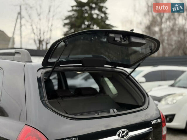 Черный Хендай Туксон, объемом двигателя 2 л и пробегом 252 тыс. км за 7200 $, фото 19 на Automoto.ua